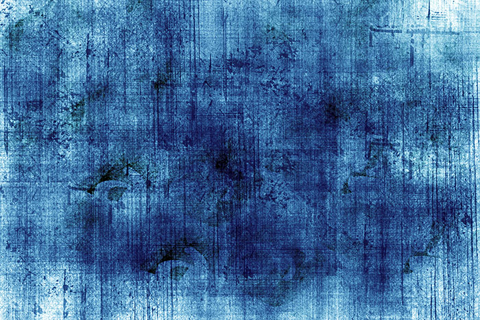 blaue zerschlissene Wandstruktur