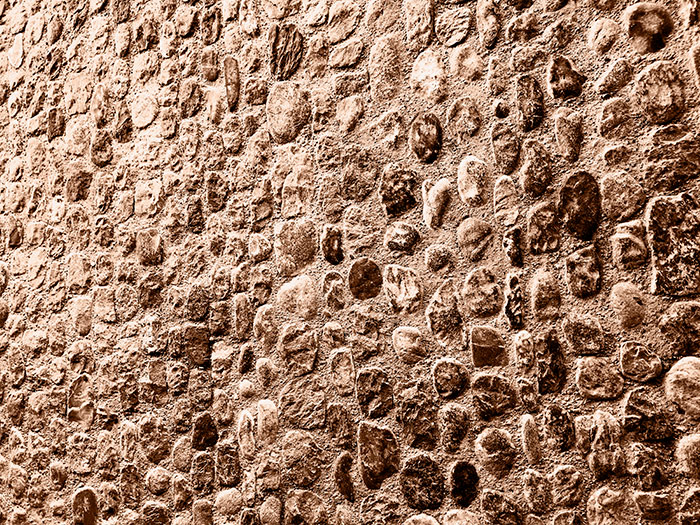 Naturfoto mit braunen Pflastersteinen als natürlicher Steinboden